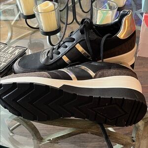 Michael Kors Women’s Black Sneakers with Gold Highlights